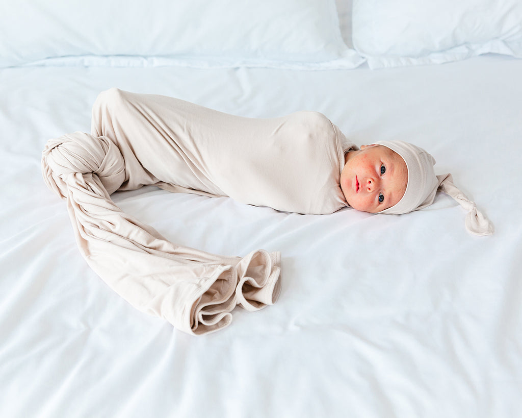 https://www.snuggleshield.com/cdn/shop/files/sstanbowswaddle_1024x1024.jpg?v=1691451681